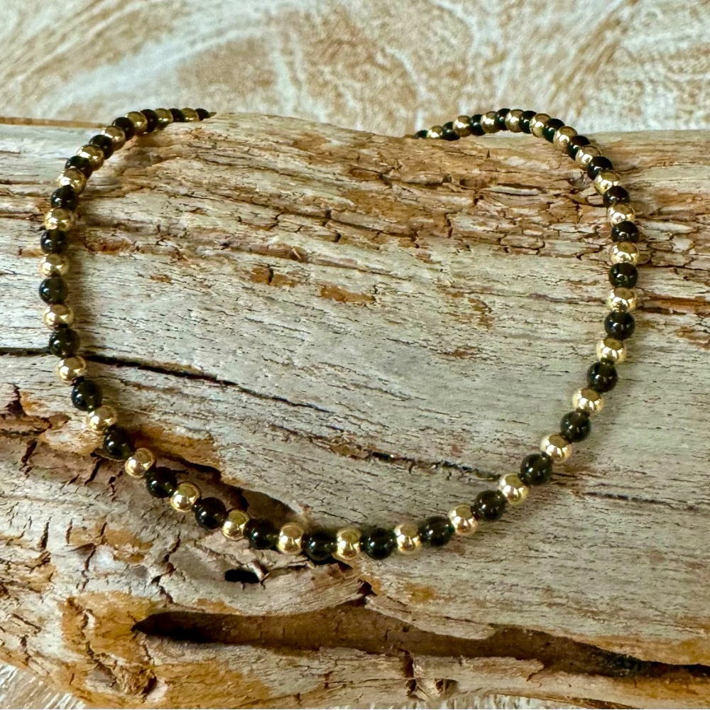 Balance bracelet - 
2mm 14k gold filled beads with 2mm black obsidian beads
